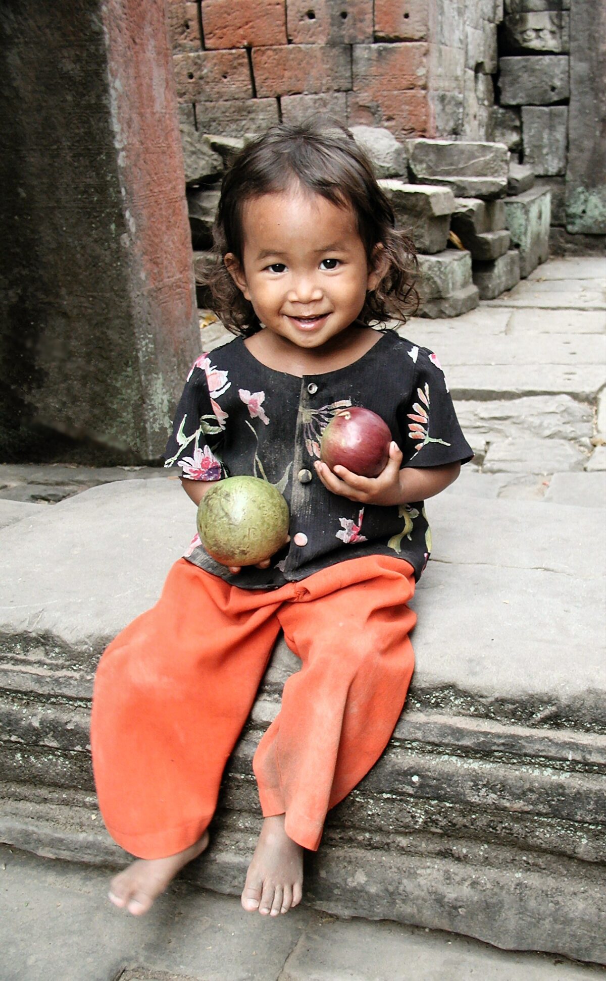 Kid with fruit